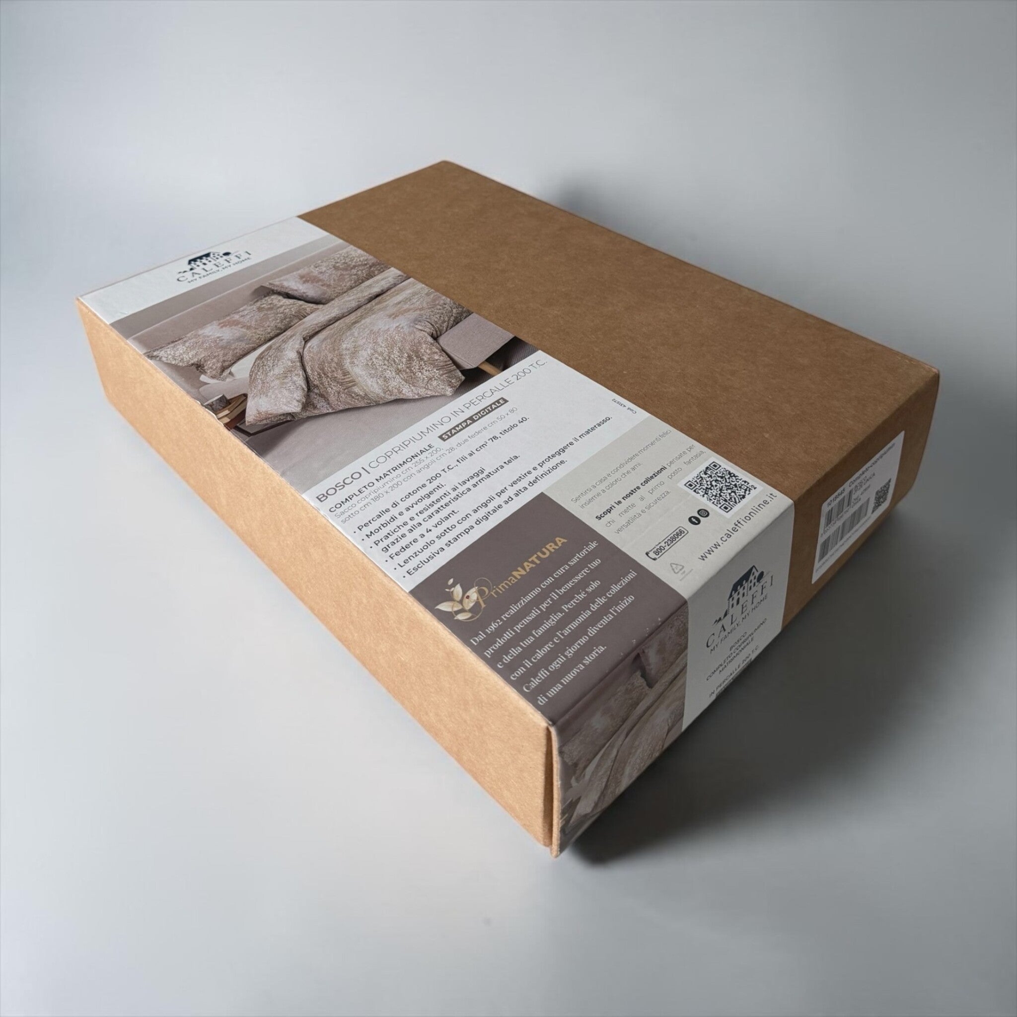 Scatola del completo copripiumino matrimoniale Caleffi Bosco con immagine del letto ed etichetta percalle 200 TC.