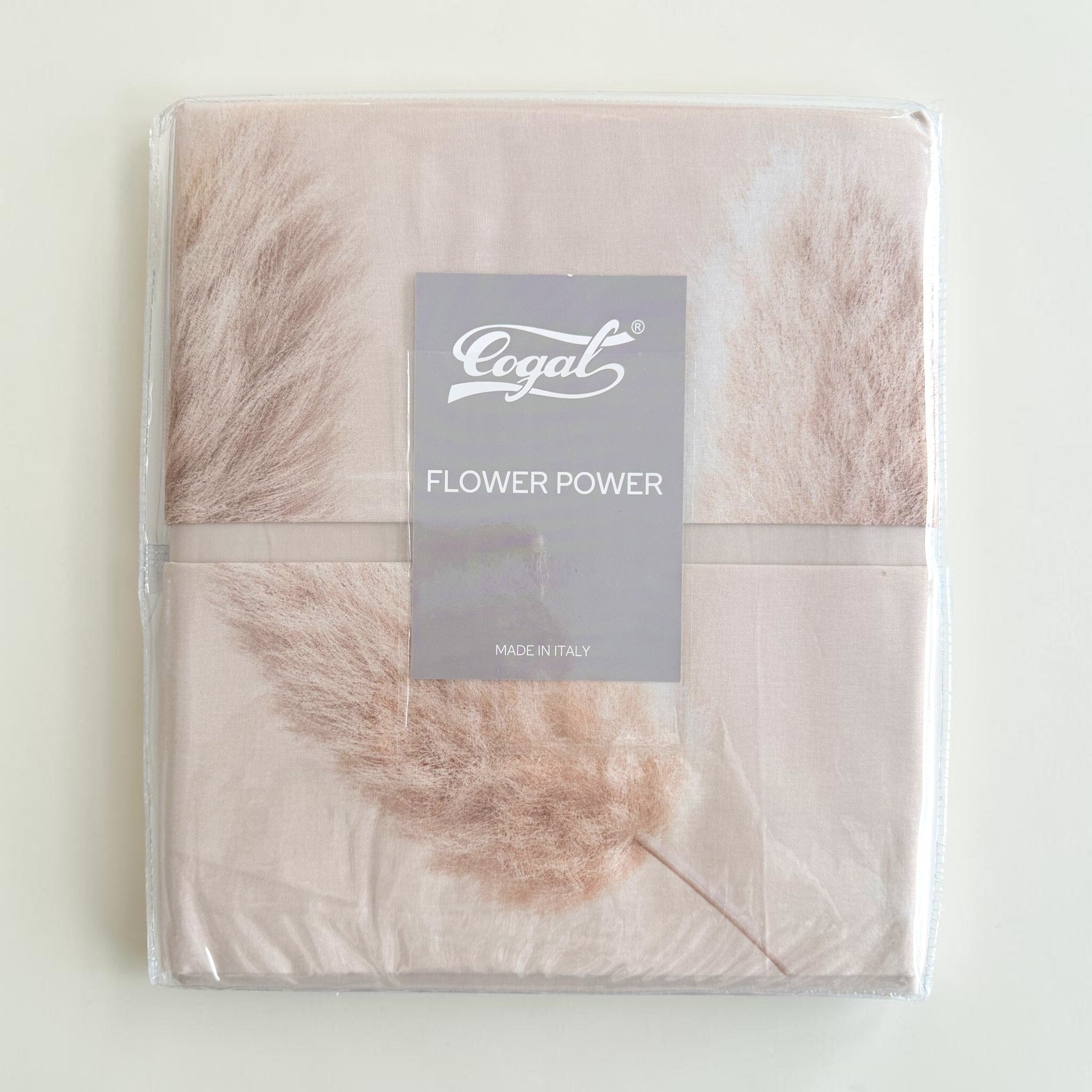 Confezione del completo lenzuola Cogal 2670 Albicocca con stampa pampas ed etichetta Flower Power Made in Italy