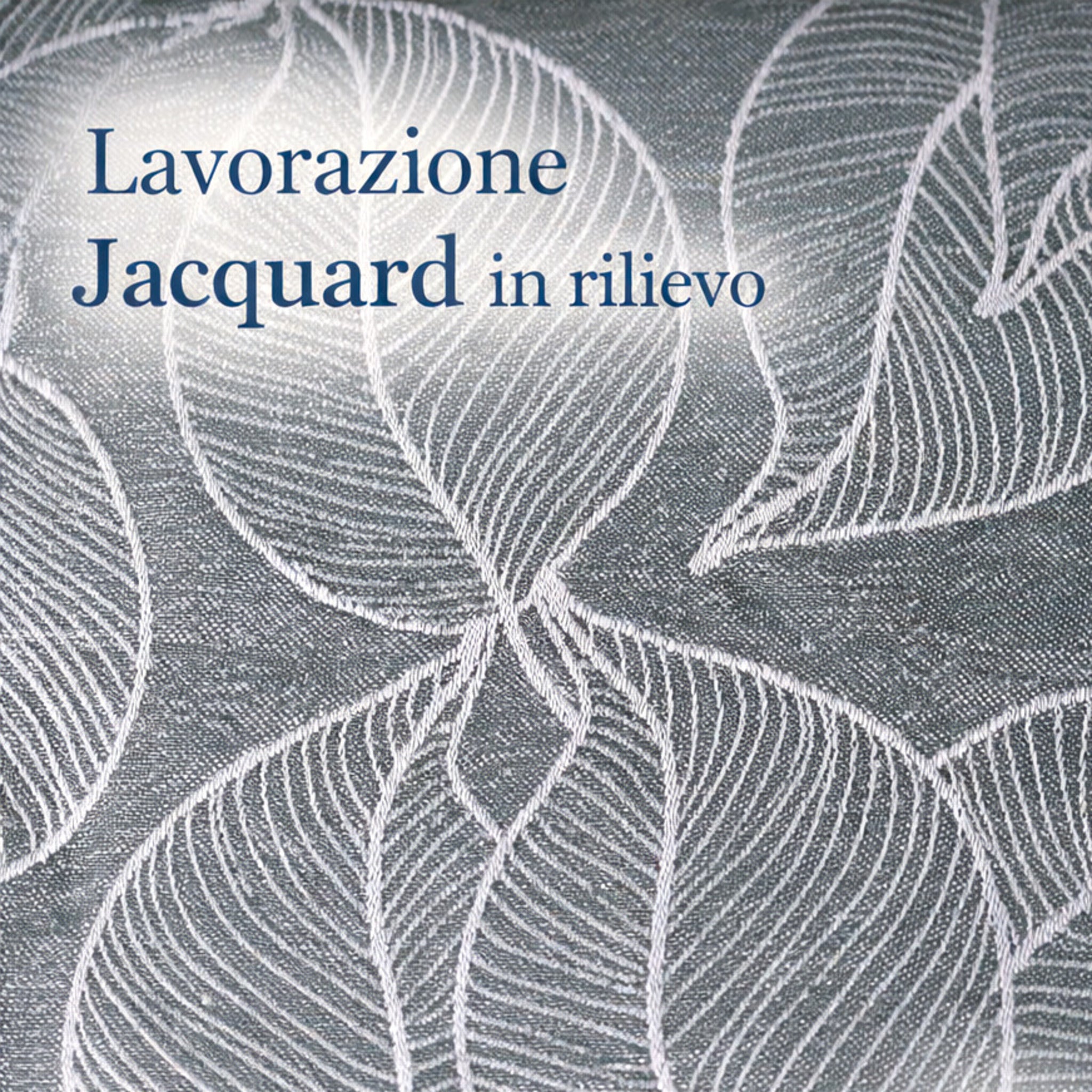 Dettaglio tessuto jacquard foglie in rilievo

