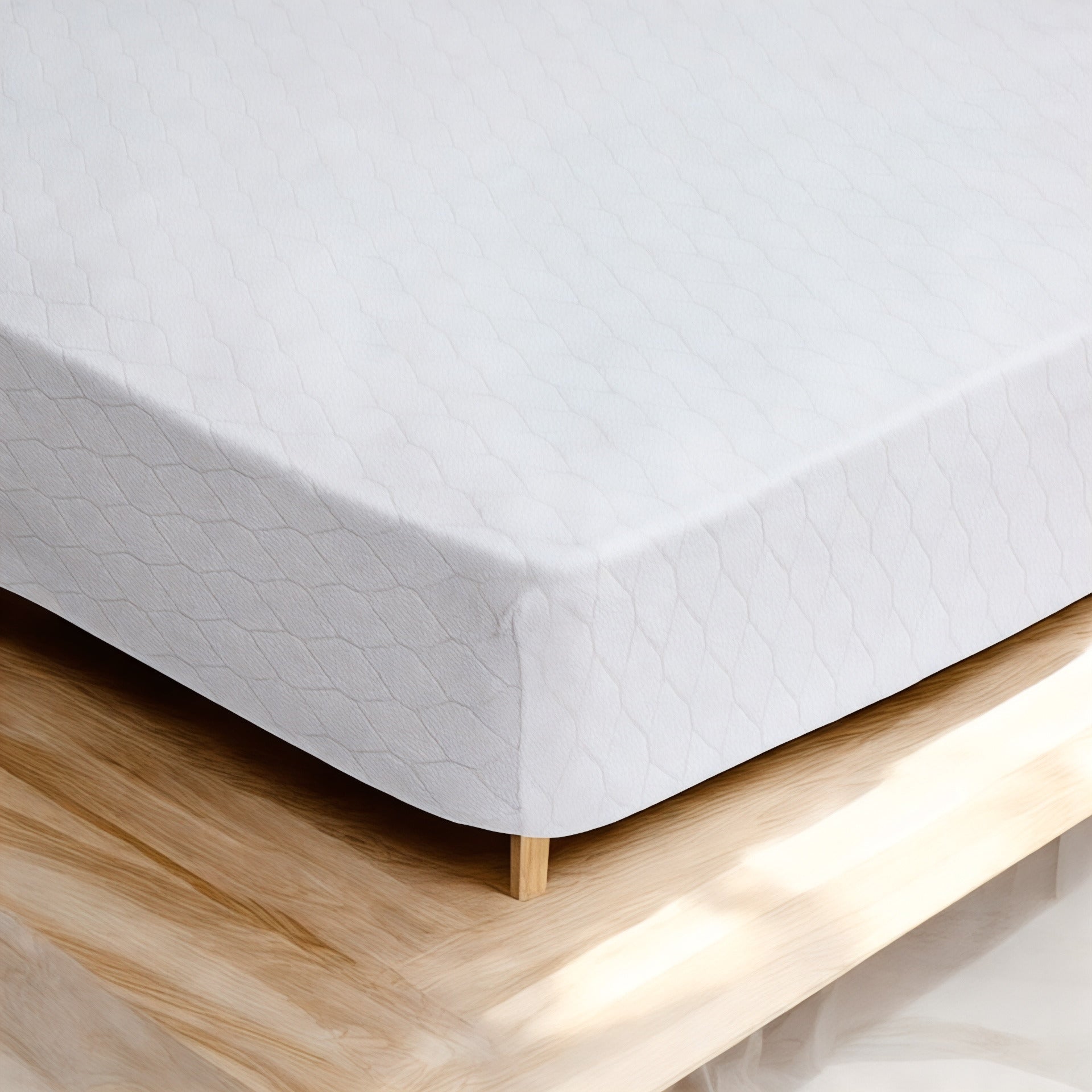 Dettaglio della lavorazione jacquard del coprimaterasso Caleffi Buonanotte