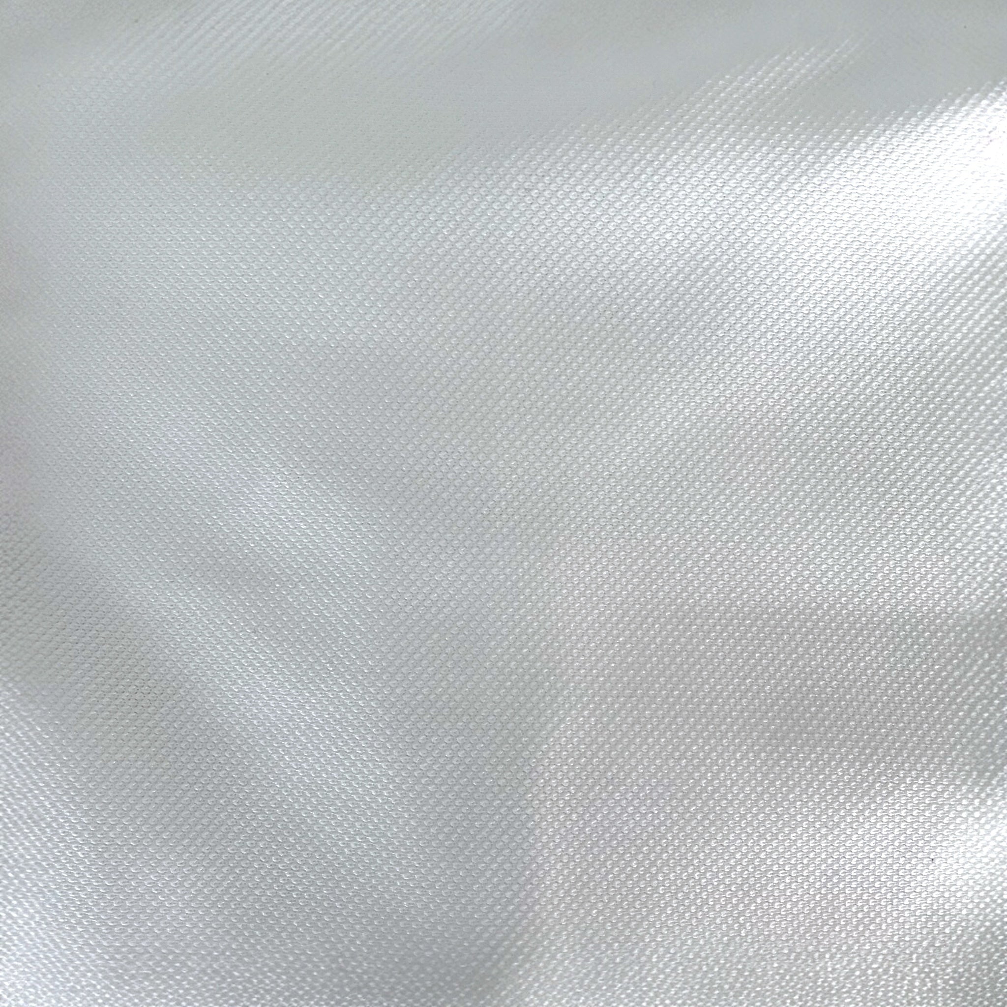 Dettaglio del tessuto bielastico elasticizzato utilizzato nei coprisedia Buccia di Mela.