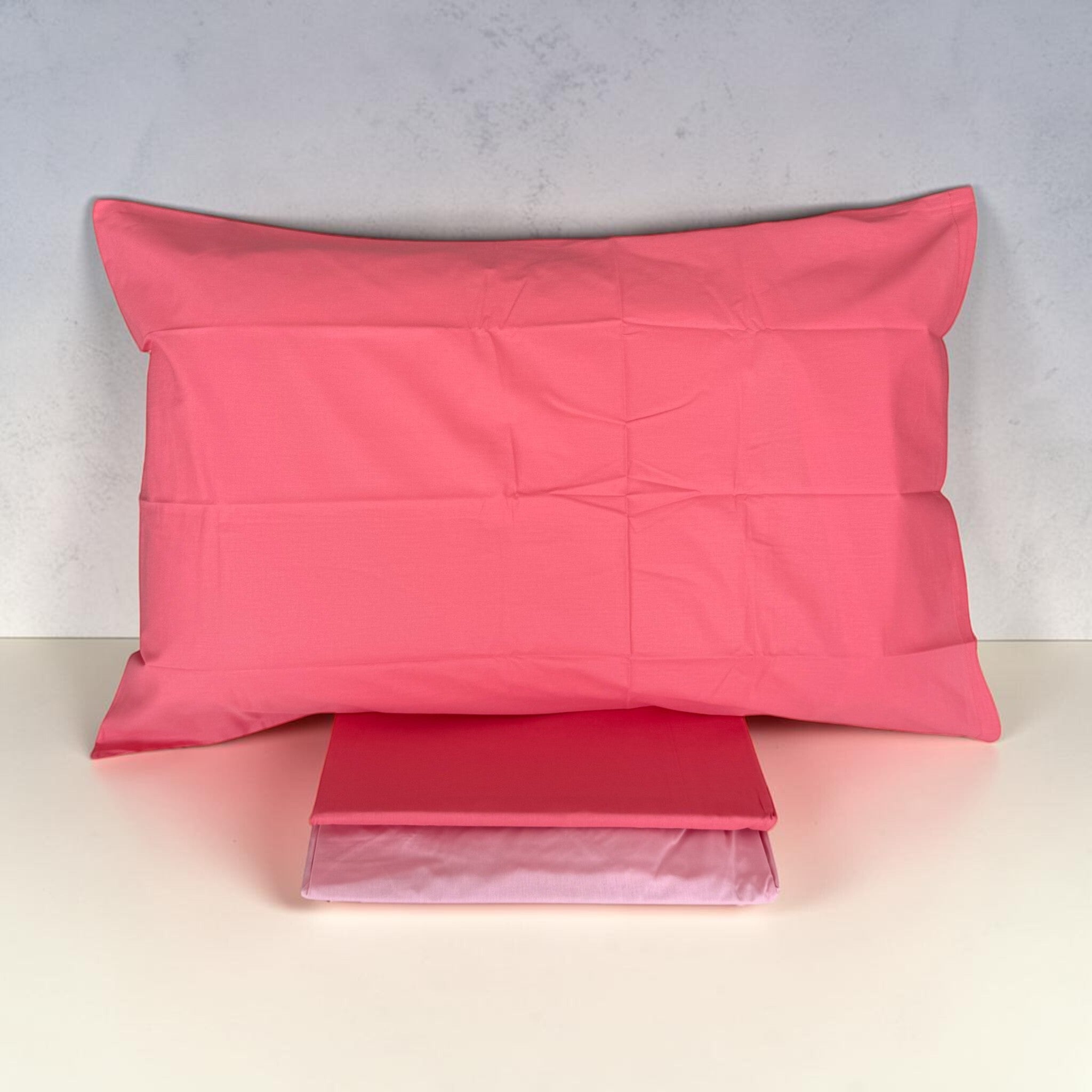 Federa double face bicolore corallo e rosa chiaro del completo lenzuola Caleffi