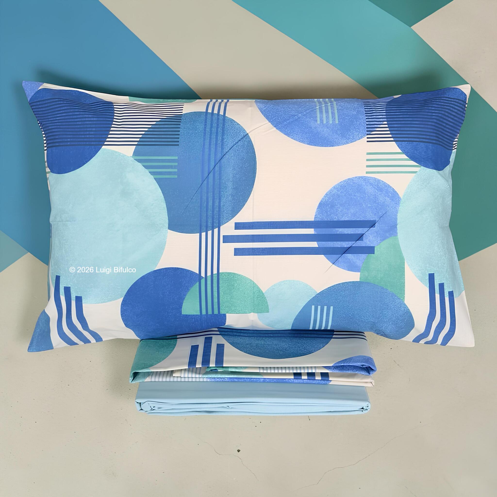 Federa coordinata del completo lenzuola matrimoniale Bassetti Glow blu con fantasia geometrica