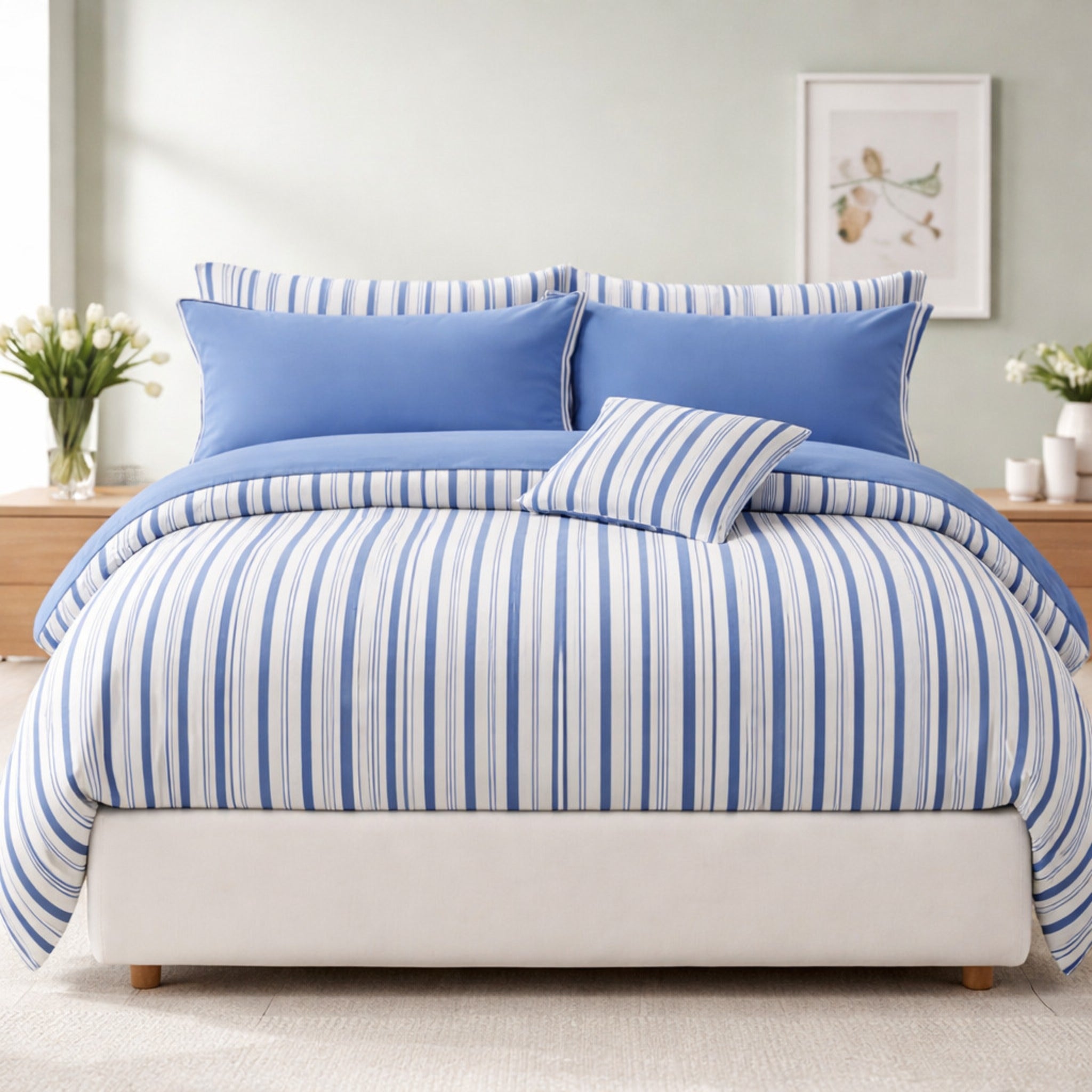 Completo lenzuola matrimoniali Cogal 9725 righe blu su letto