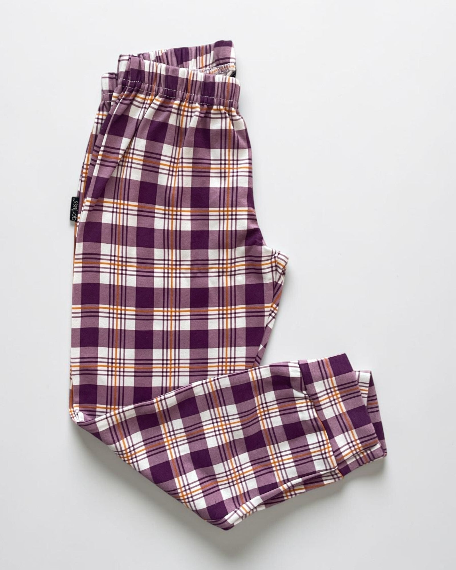 Dettaglio pantalone scozzese prugna del pigiama bambina Santoro Gorjuss 63409