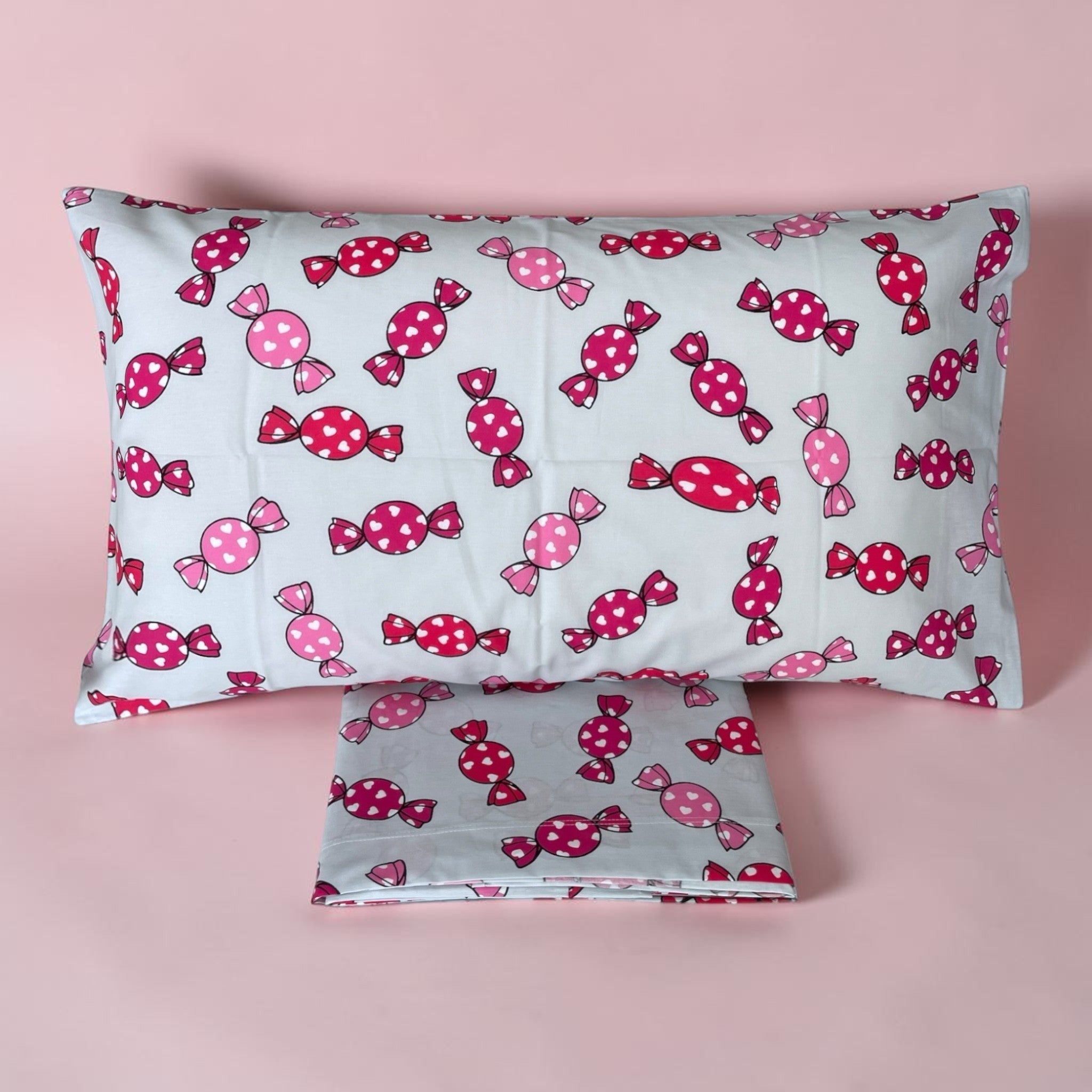 Federa e sacco copripiumino Zambaiti Melle con fantasia caramelle rosa e fucsia