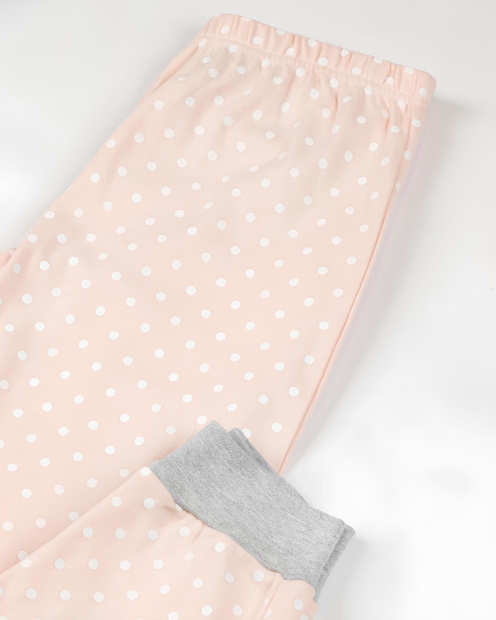 Dettaglio pantalone rosa a pois del pigiama bambina Disney Minnie 56464