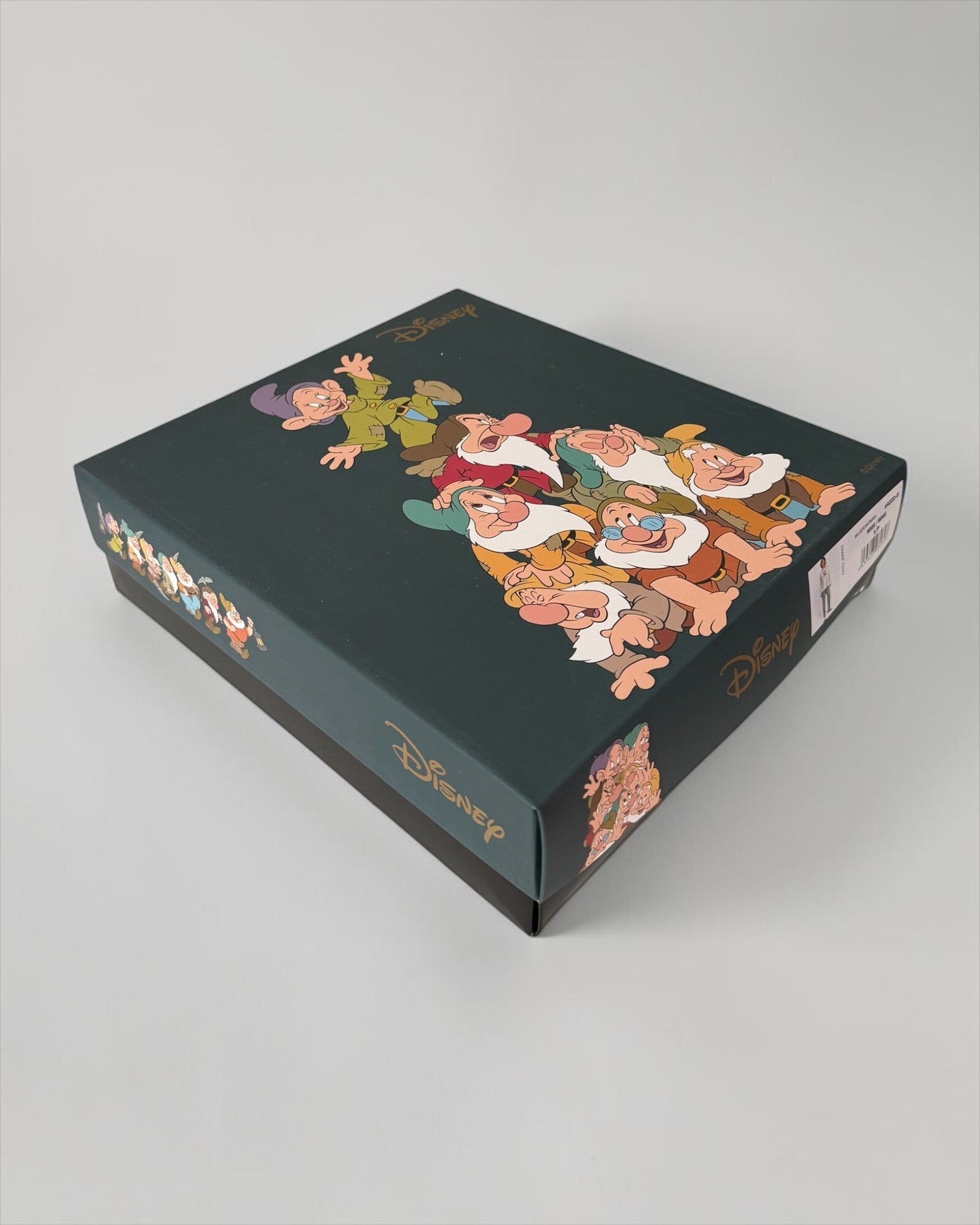 Scatola del pigiama Disney Cucciolo 64322, con coperchio verde decorato con i sette nani e logo Disney