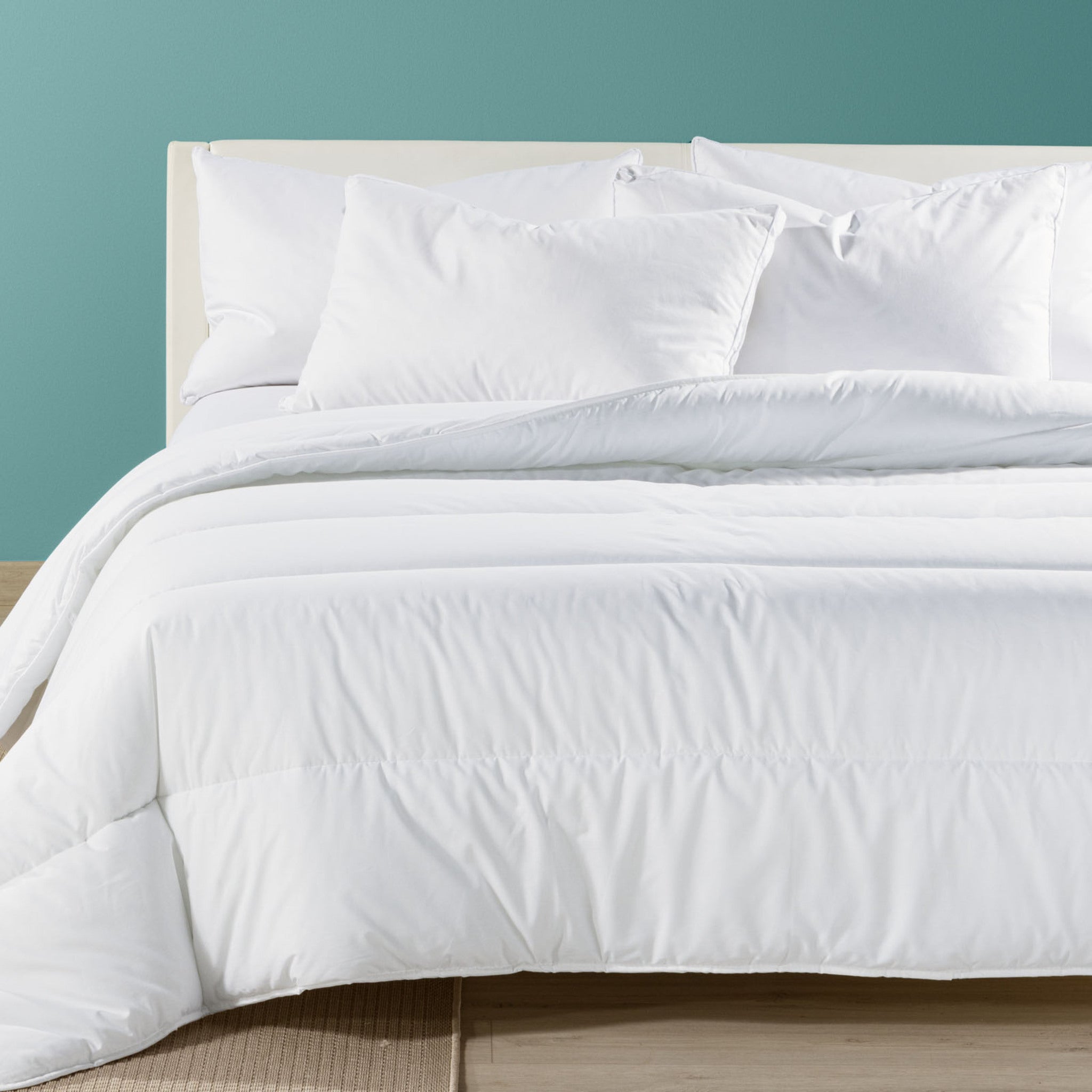 Piumino Caleffi Sofy in cotone bianco sul letto, modello invernale caldo con fibra Sofy