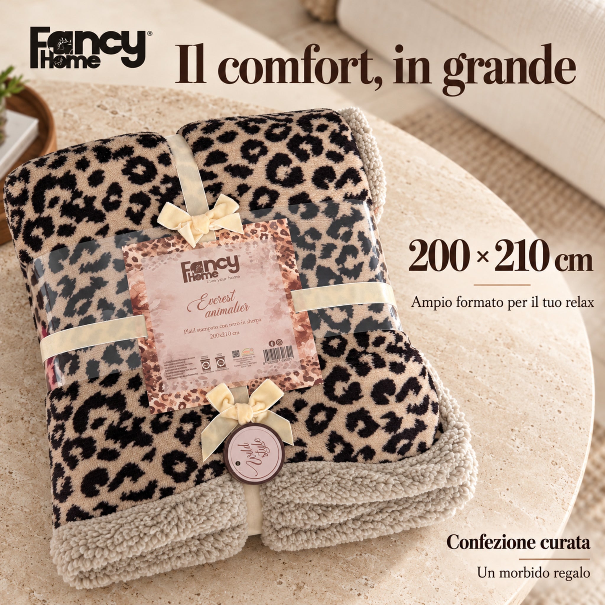 Plaid Everest leopardato beige piegato nella confezione con fiocchi chiari e indicazione della misura 200×210 cm.