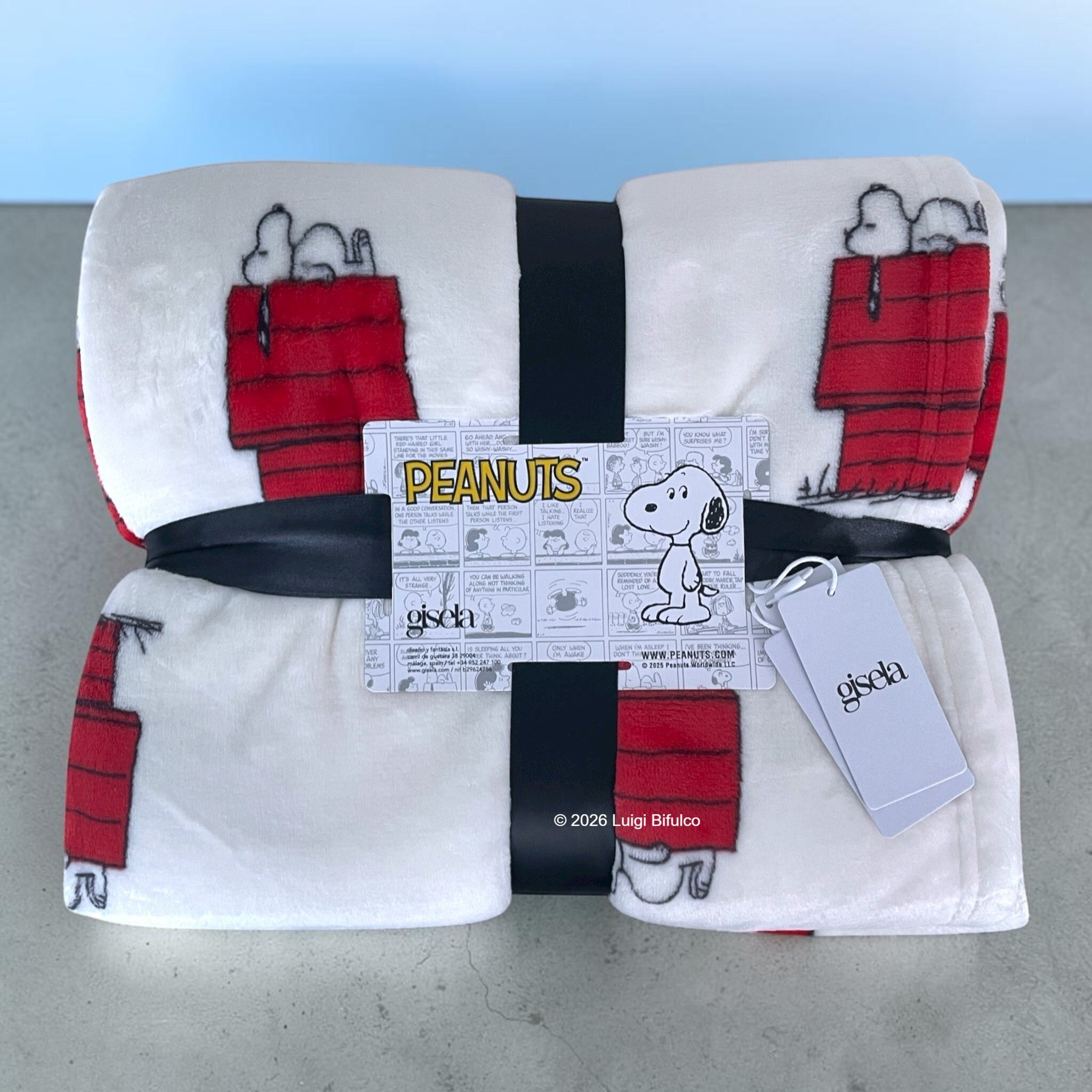 Plaid Gisela Snoopy confezionato nella pratica busta originale pronto da regalare
