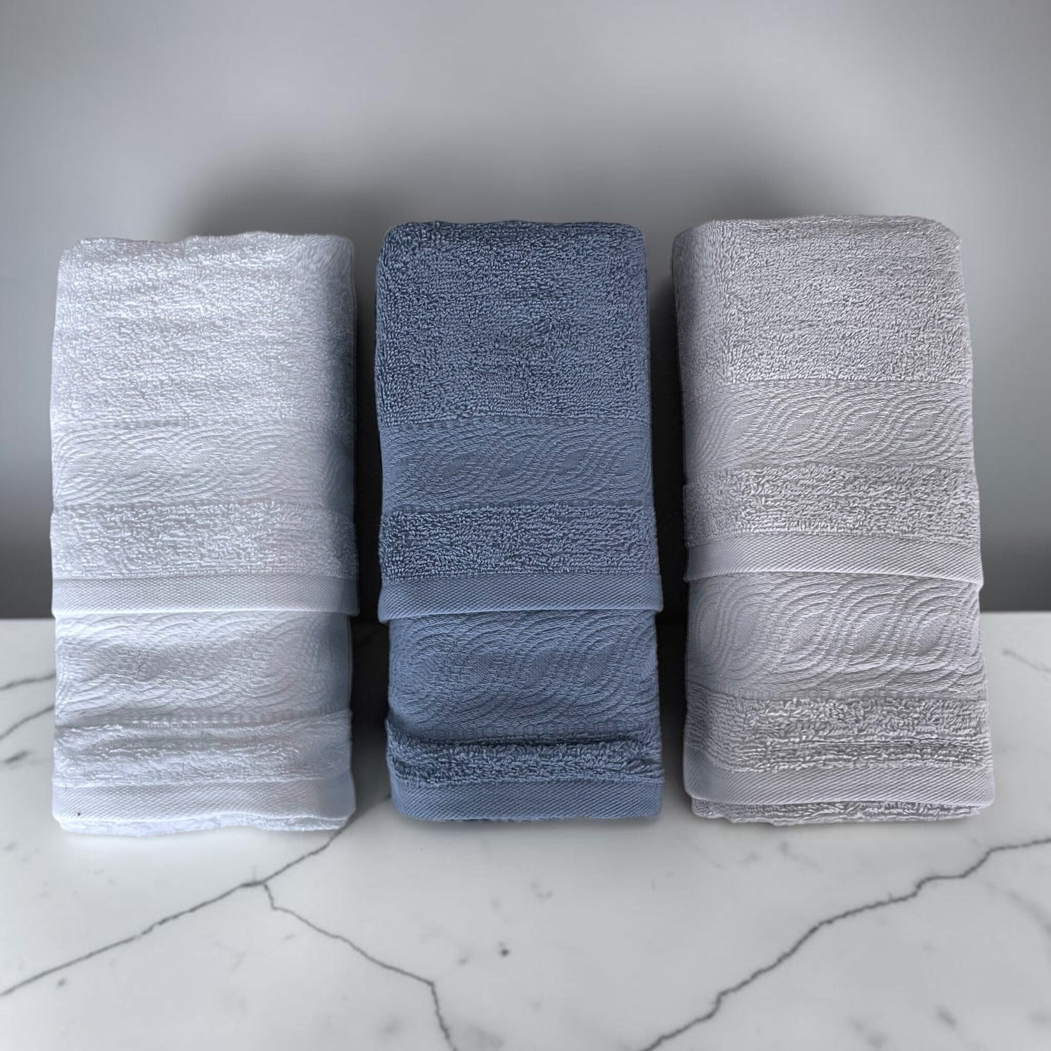 Asciugamani Rebecca Home Onda bianco, indigo e grigio con motivo a onde