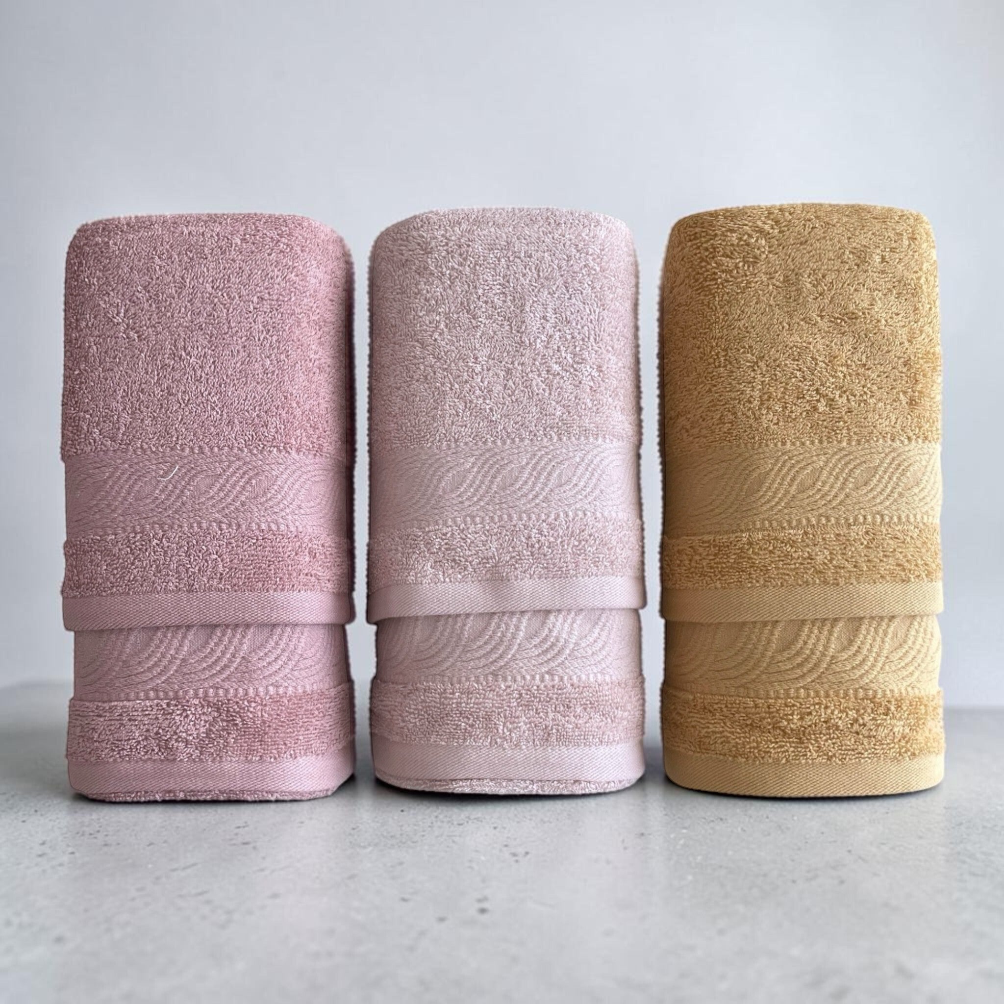 Asciugamani Rebecca Home Onda rosa antico, cipria e giallo con balza jacquard