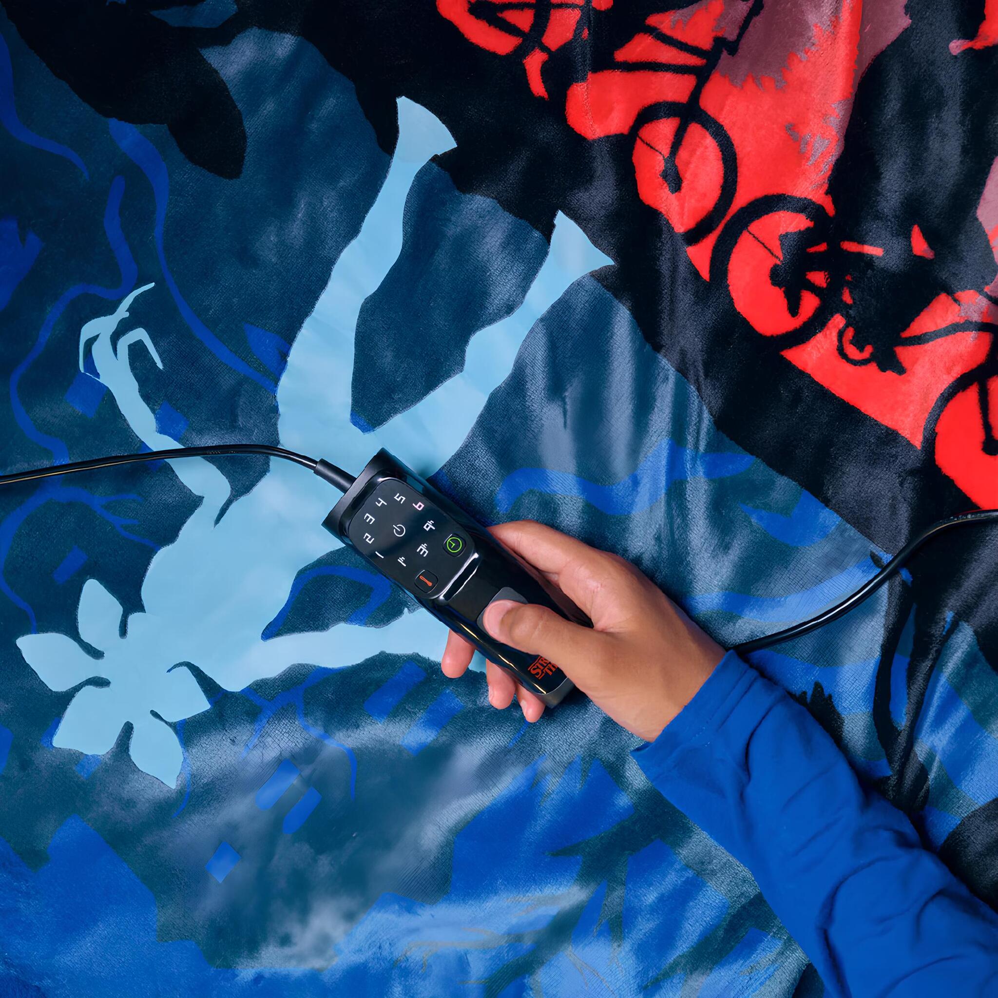 Telecomando del plaid riscaldabile Imetec Stranger Things con 6 livelli di calore e timer