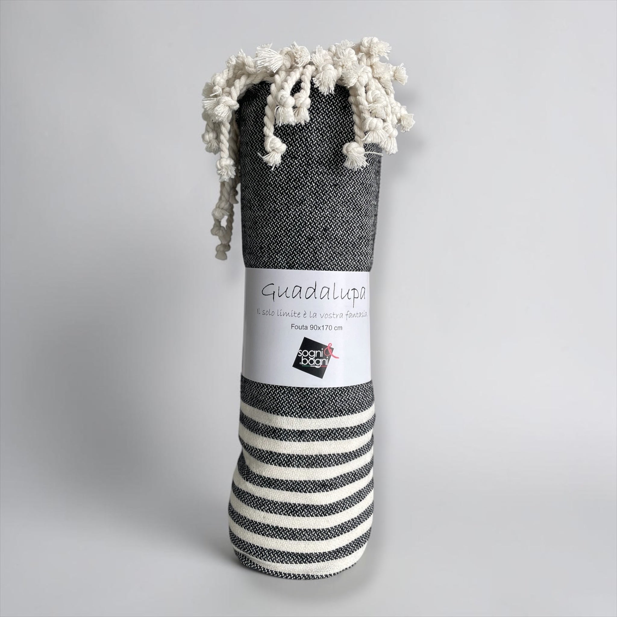 Telo mare fouta Cogal Guadalupa antracite confezionato con frange decorative intrecciate