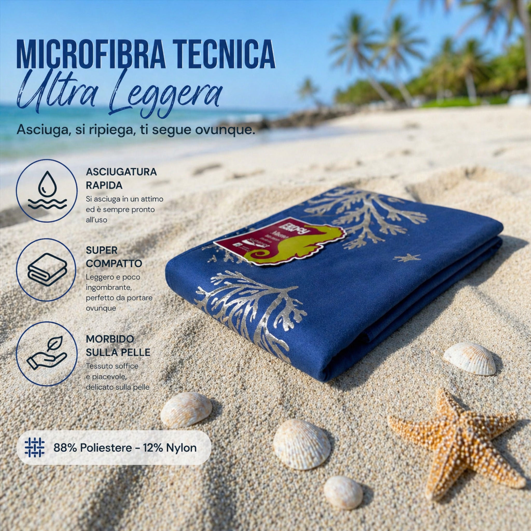 telo mare blu piegato con fantasia marina coralli e conchiglie
