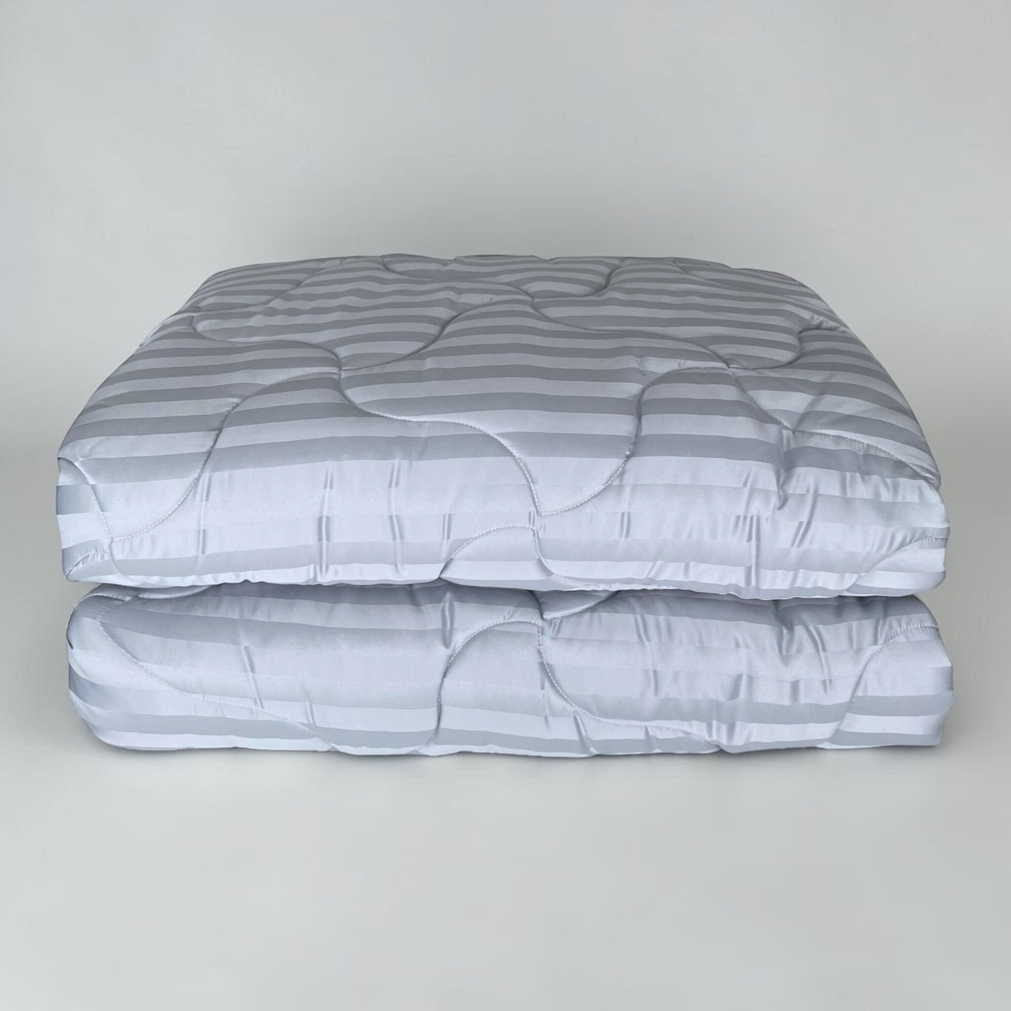 Trapunta matrimoniale Zambaiti Allure piegata con fantasia rigata jacquard ghiaccio