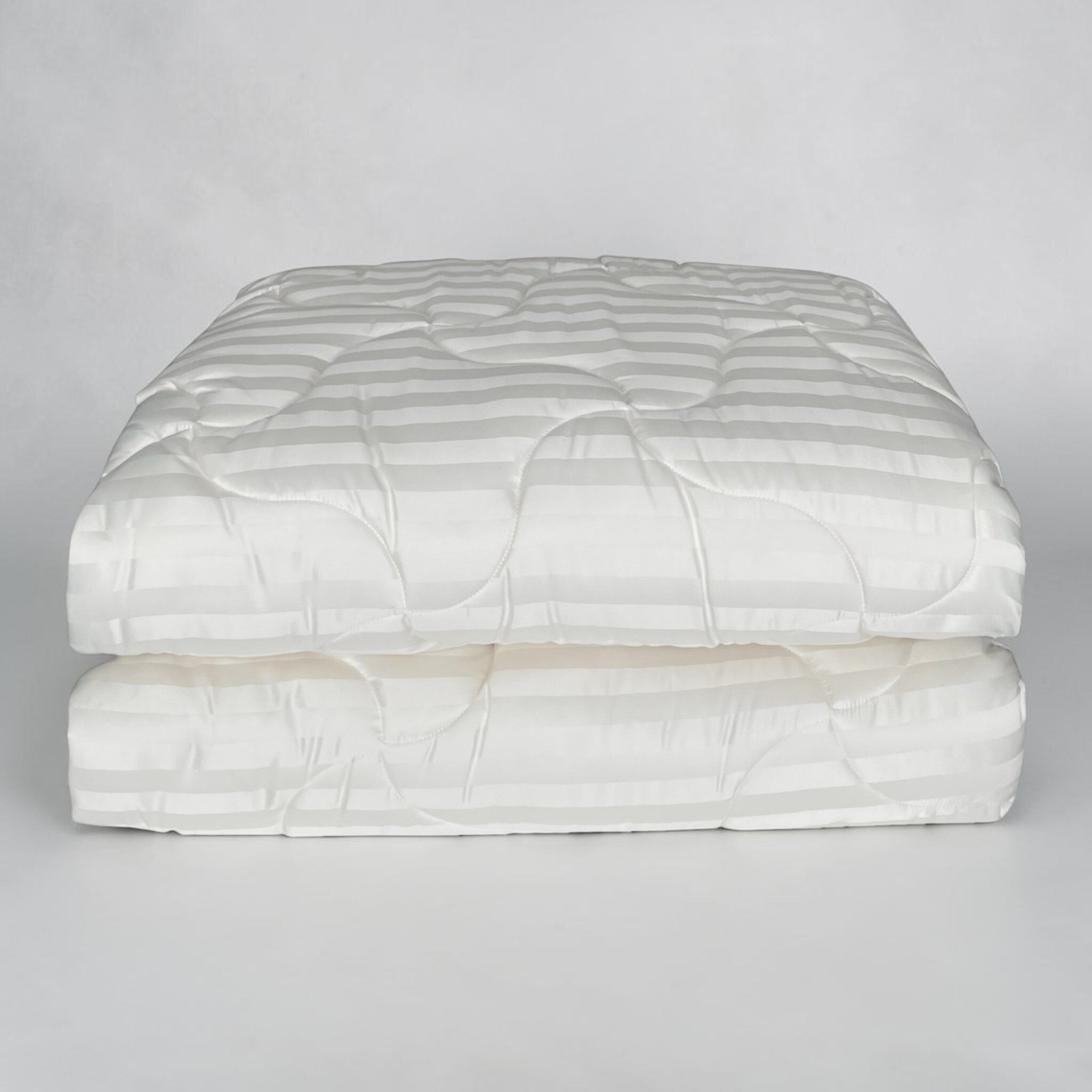 Trapunta matrimoniale Zambaiti Allure piegata con fantasia rigata jacquard panna